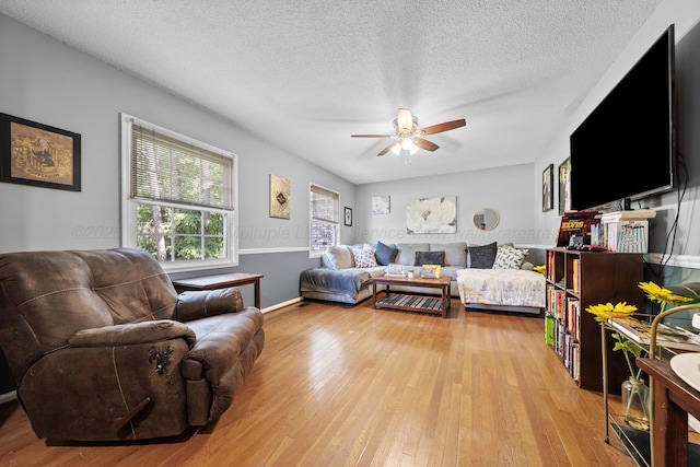 1812 N Walston Rd, Jasper, AL 35504 - living room featuring ceiling fan, light wood finished floors, and a textured ceiling