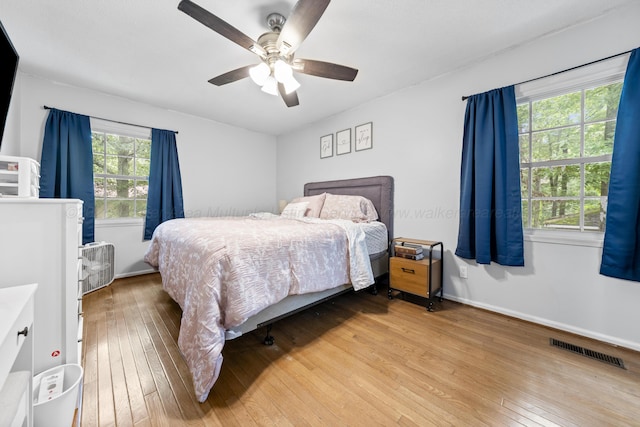 1812 N Walston Rd, Jasper, AL 35504 - bedroom featuring hardwood / wood-style flooring and a ceiling fan