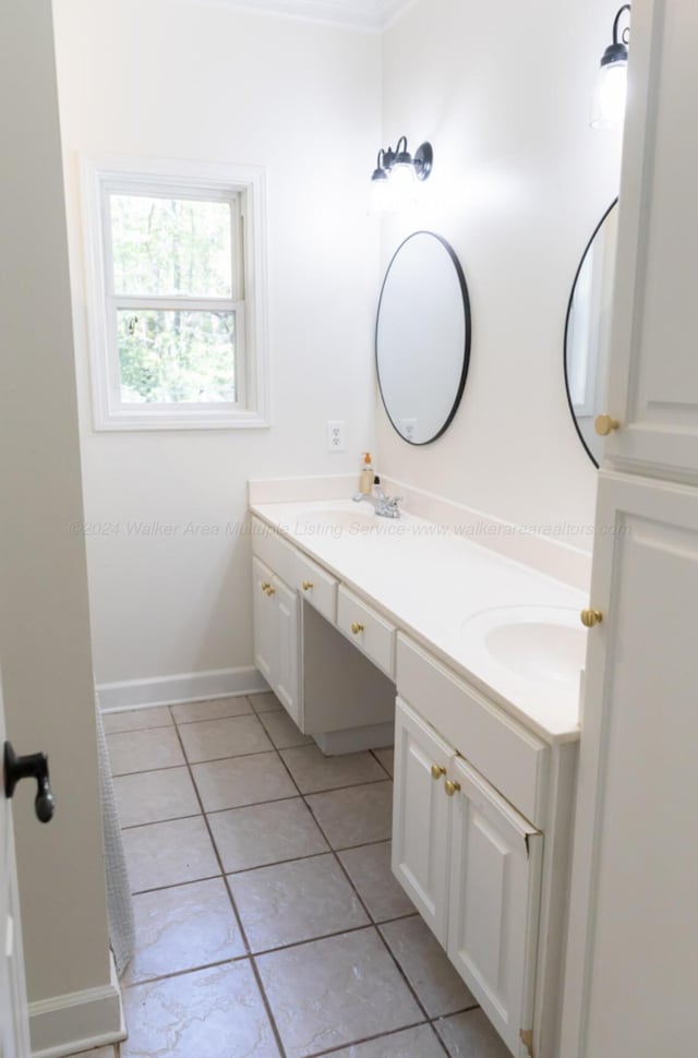 bathroom featuring tile patterned floors and vanity