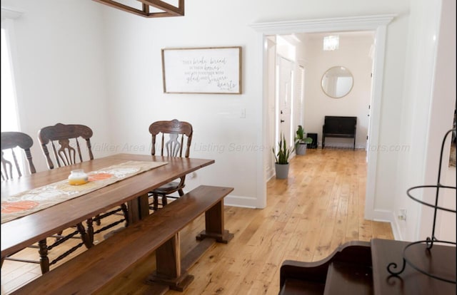 dining area featuring light wood-type flooring