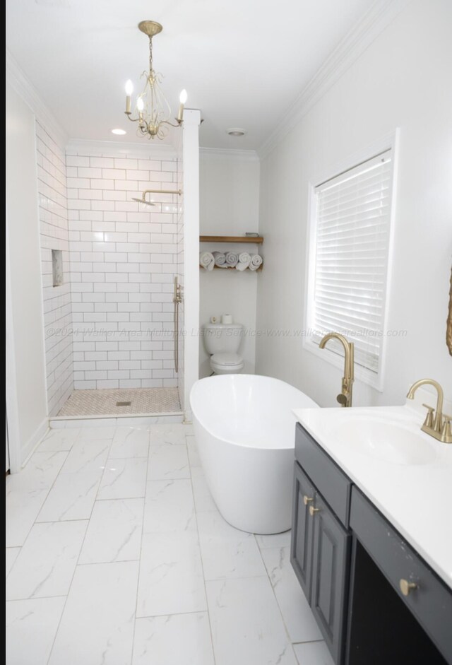 bathroom featuring vanity, crown molding, an inviting chandelier, and shower with separate bathtub