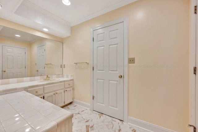 129 County Road 293, Cullman, AL 35057 - bathroom with baseboards, marble finish floors, vanity, ornamental molding, and recessed lighting