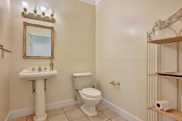 129 County Road 293, Cullman, AL 35057 - half bath featuring baseboards, tile patterned floors, and toilet