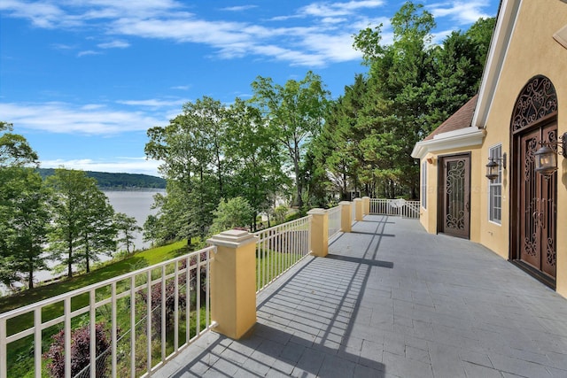 129 County Road 293, Cullman, AL 35057 - view of patio with a water view and a balcony
