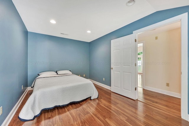 129 County Road 293, Cullman, AL 35057 - bedroom with baseboards, wood finished floors, and recessed lighting