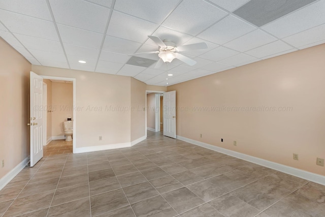 129 County Road 293, Cullman, AL 35057 - spare room with tile patterned flooring, ceiling fan, a paneled ceiling, baseboards, and recessed lighting