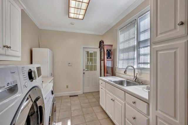 129 County Road 293, Cullman, AL 35057 - washroom with independent washer and dryer, plenty of natural light, light tile patterned floors, ornamental molding, and baseboards