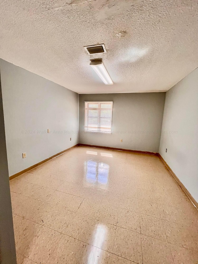 9670 Smith Lake Rd, Jasper, AL 35504 - spare room featuring baseboards