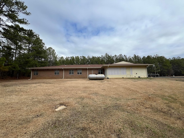 9670 Smith Lake Rd, Jasper, AL 35504 - rear view of property featuring a lawn