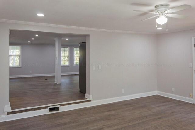 713 Hillsdale Rd, Jasper, AL 35504 - unfurnished room featuring ornamental molding, visible vents, ceiling fan, and wood finished floors