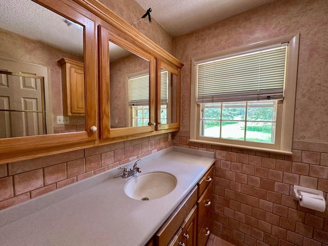 312 Crescent Cir, Jasper, AL 35503 - bathroom with vanity and a textured ceiling