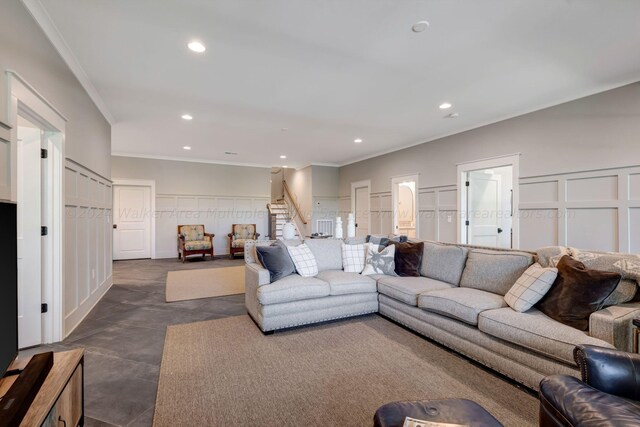 397 Blue Water Pointe Dr, Jasper, AL 35504 - living room with a wainscoted wall, a decorative wall, crown molding, stairs, and recessed lighting