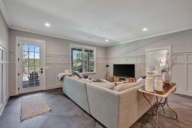 397 Blue Water Pointe Dr, Jasper, AL 35504 - living room with crown molding, recessed lighting, concrete floors, and a decorative wall