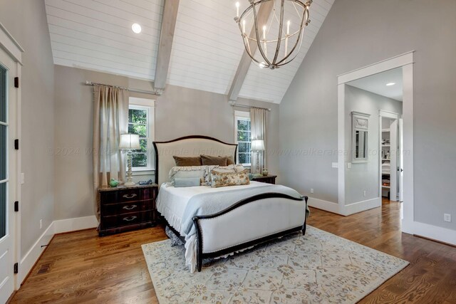 397 Blue Water Pointe Dr, Jasper, AL 35504 - bedroom with baseboards, high vaulted ceiling, wood finished floors, and a chandelier
