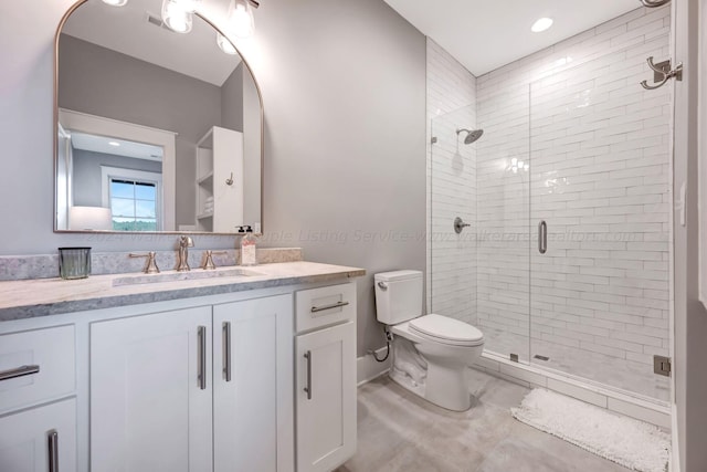 397 Blue Water Pointe Dr, Jasper, AL 35504 - bathroom with vanity, toilet, and a shower stall