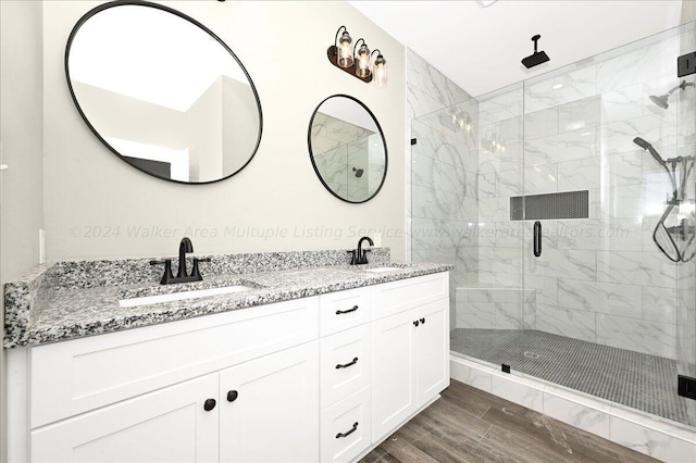 3195 County Road 51, Bremen, AL 35033 - bathroom featuring double vanity, a sink, and a stall shower