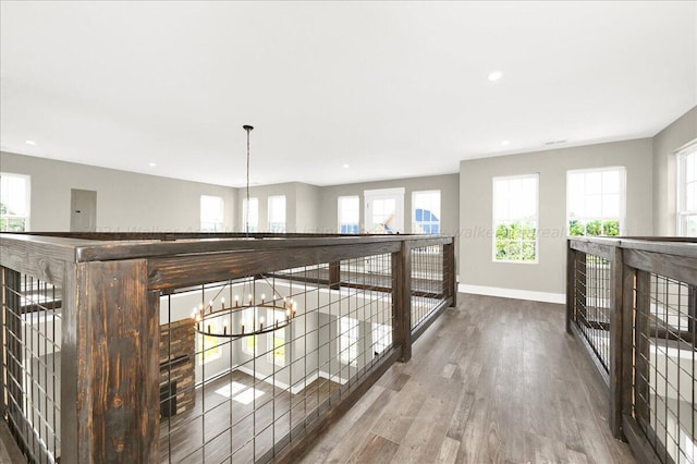 3195 County Road 51, Bremen, AL 35033 - hallway featuring an inviting chandelier, recessed lighting, baseboards, and wood finished floors