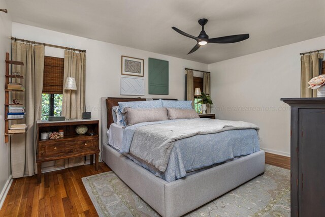 400 N Crest Cir, Jasper, AL 35501 - bedroom with wood finished floors, baseboards, and ceiling fan