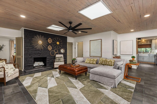 400 N Crest Cir, Jasper, AL 35501 - living area featuring wooden ceiling, ceiling fan, a fireplace, recessed lighting, and dark wood-type flooring