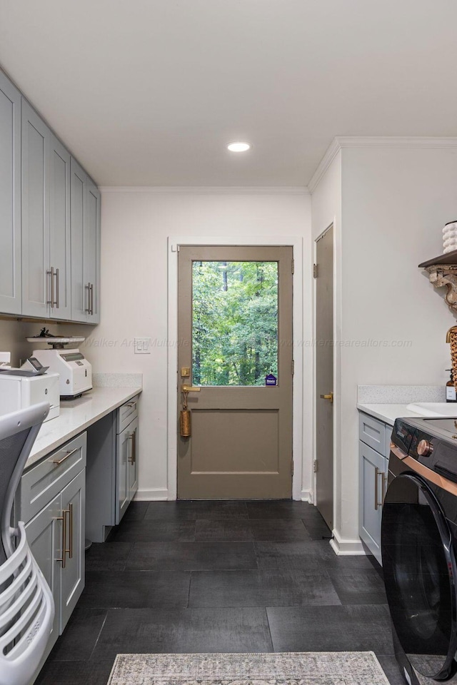 400 N Crest Cir, Jasper, AL 35501 - laundry area with cabinet space, dark wood finished floors, recessed lighting, and baseboards