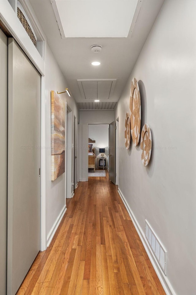 400 N Crest Cir, Jasper, AL 35501 - hall featuring attic access, wood-type flooring, and baseboards