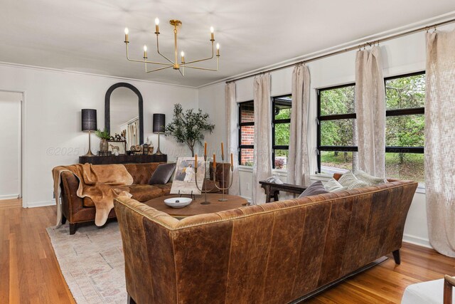 400 N Crest Cir, Jasper, AL 35501 - living room featuring a chandelier, wood finished floors, and crown molding