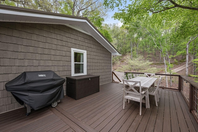 58 Lake Ln, Jasper, AL 35504 - wooden deck with outdoor dining space and a grill