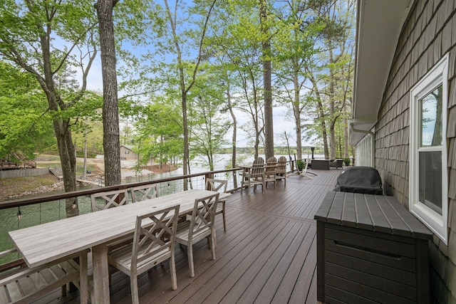 58 Lake Ln, Jasper, AL 35504 - wooden terrace featuring a water view and outdoor dining area