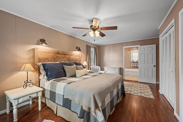 58 Lake Ln, Jasper, AL 35504 - bedroom with baseboards, ensuite bathroom, crown molding, dark wood-type flooring, and ceiling fan