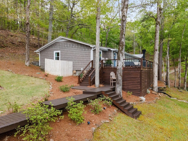 58 Lake Ln, Jasper, AL 35504 - rear view of property with stairway and a deck