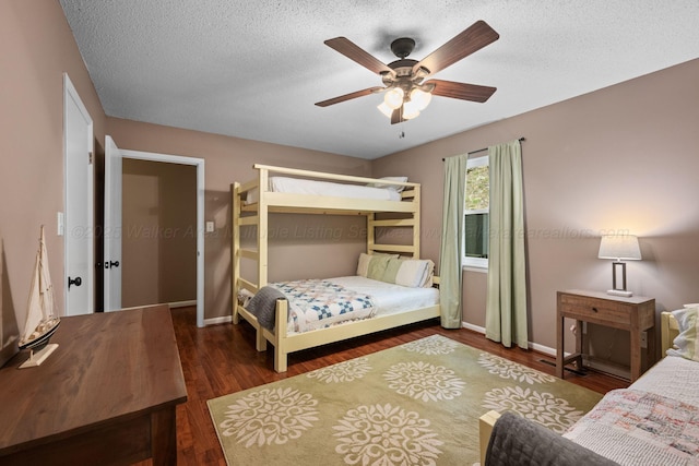 58 Lake Ln, Jasper, AL 35504 - bedroom with wood finished floors, baseboards, and a ceiling fan