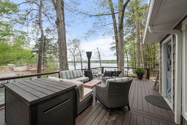 58 Lake Ln, Jasper, AL 35504 - wooden deck featuring a water view and an outdoor hangout area