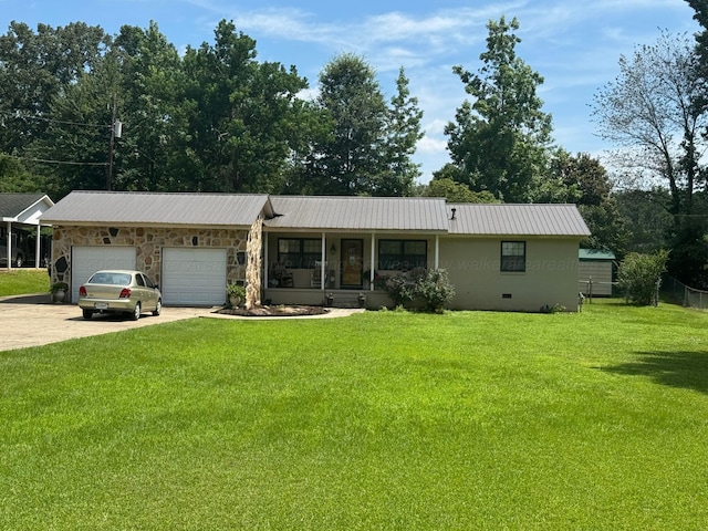 1107 Forest Rd, Jasper, AL 35504 - single story home with a front lawn, an attached garage, concrete driveway, and a metal roof