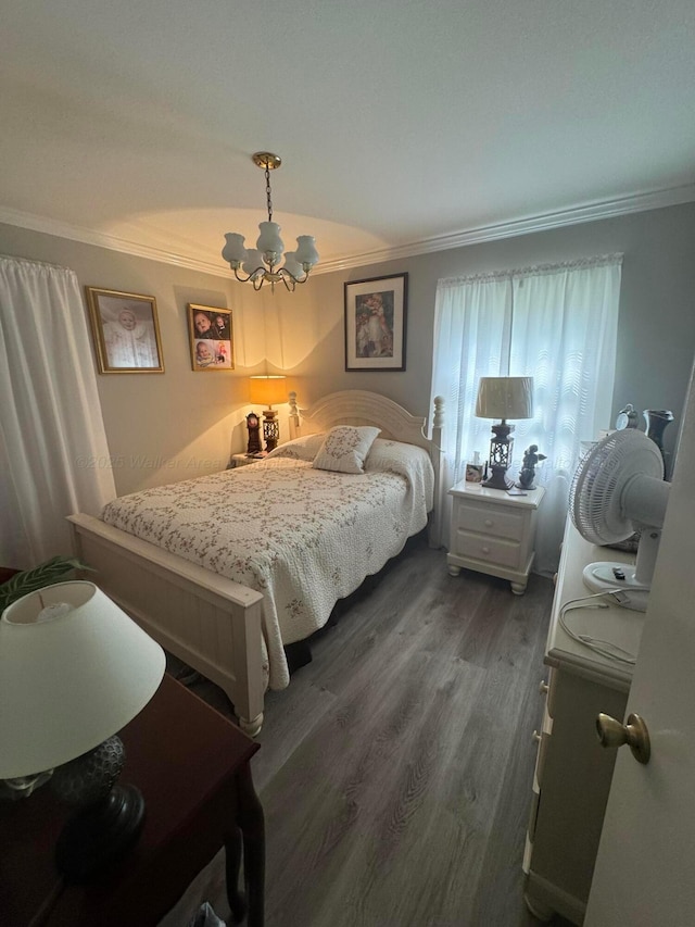 1107 Forest Rd, Jasper, AL 35504 - bedroom featuring ornamental molding, a chandelier, and dark wood finished floors