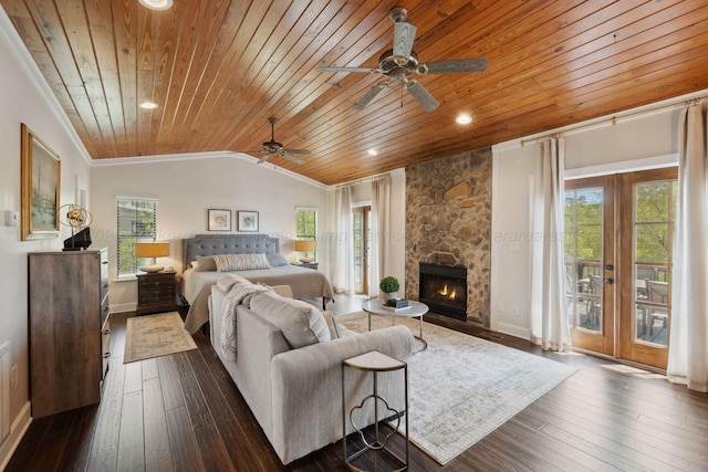 bedroom with wooden ceiling, a fireplace, dark wood-type flooring, crown molding, and access to exterior
