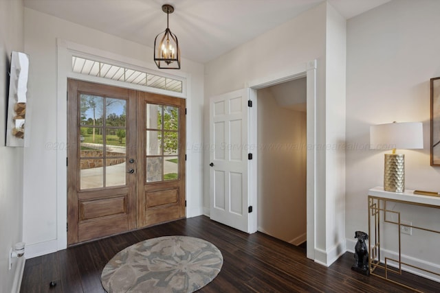 entryway with baseboards, dark wood-style flooring, and french doors