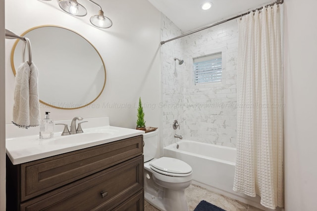 full bath with toilet, shower / bath combination with curtain, and vanity