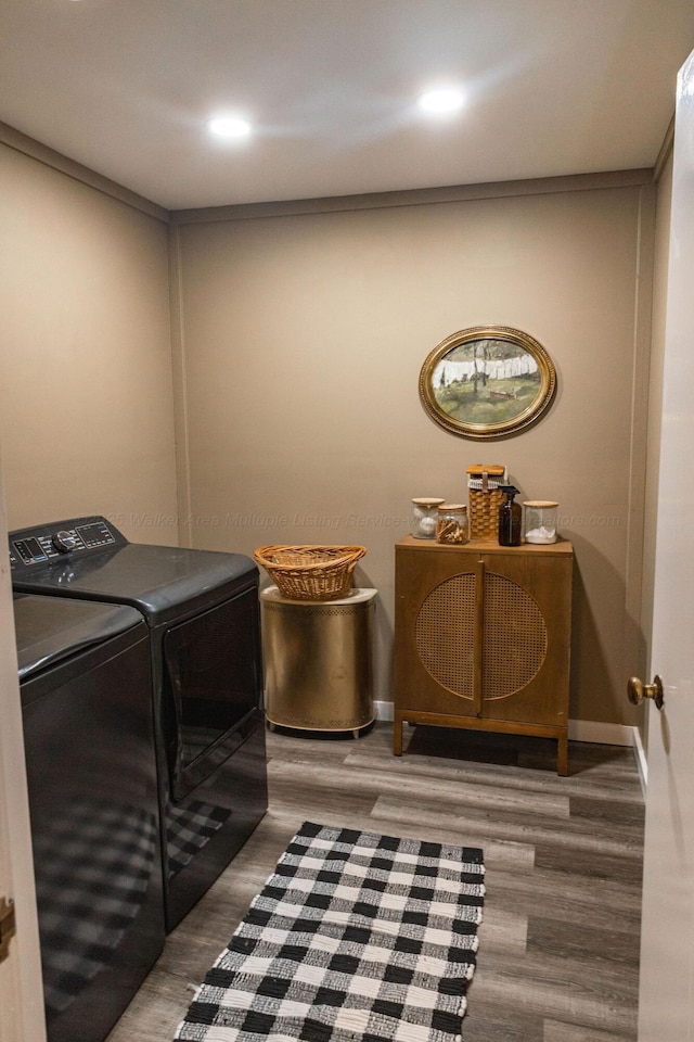 605 W 6th St, Jasper, AL 35501 - washroom featuring washing machine and dryer, wood finished floors, and recessed lighting