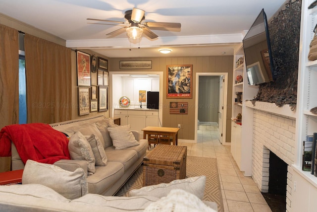 605 W 6th St, Jasper, AL 35501 - living room with a ceiling fan, light tile patterned floors, and a fireplace