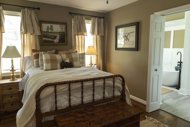 605 W 6th St, Jasper, AL 35501 - bedroom with wood finished floors and baseboards