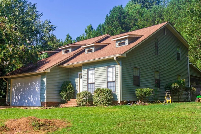 501 Duskin Rd, Jasper, AL 35504 - view of front facade featuring a front yard, roof with shingles, and an attached garage