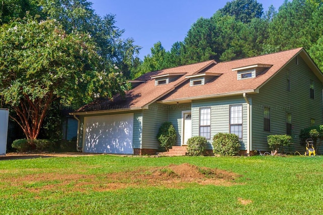 501 Duskin Rd, Jasper, AL 35504 - view of front facade featuring a front yard, a garage, and roof with shingles