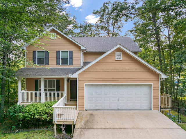 1528 Sipsey Rd, Double Springs, AL 35553 - traditional-style house featuring covered porch, concrete driveway, an attached garage, and roof with shingles