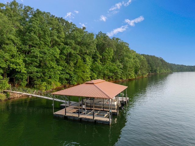 1528 Sipsey Rd, Double Springs, AL 35553 - dock area featuring boat lift, a wooded view, and a water view