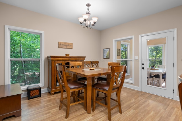 1528 Sipsey Rd, Double Springs, AL 35553 - dining space featuring a chandelier and light wood-style floors