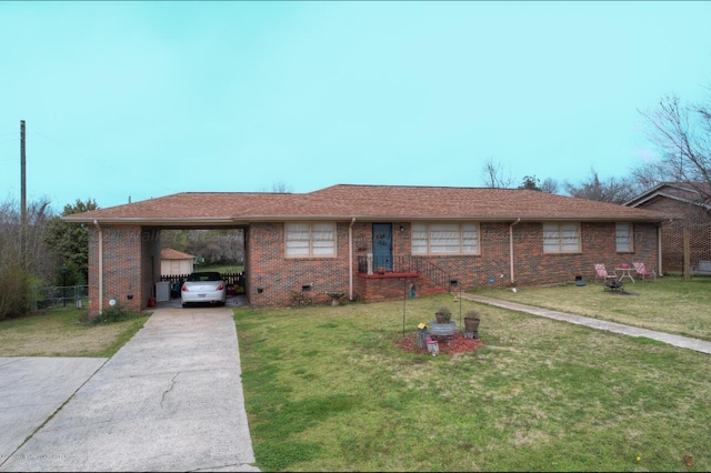 307 Amory Ave, Cordova, AL 35550 - ranch-style home with an attached carport, a front yard, brick siding, and driveway