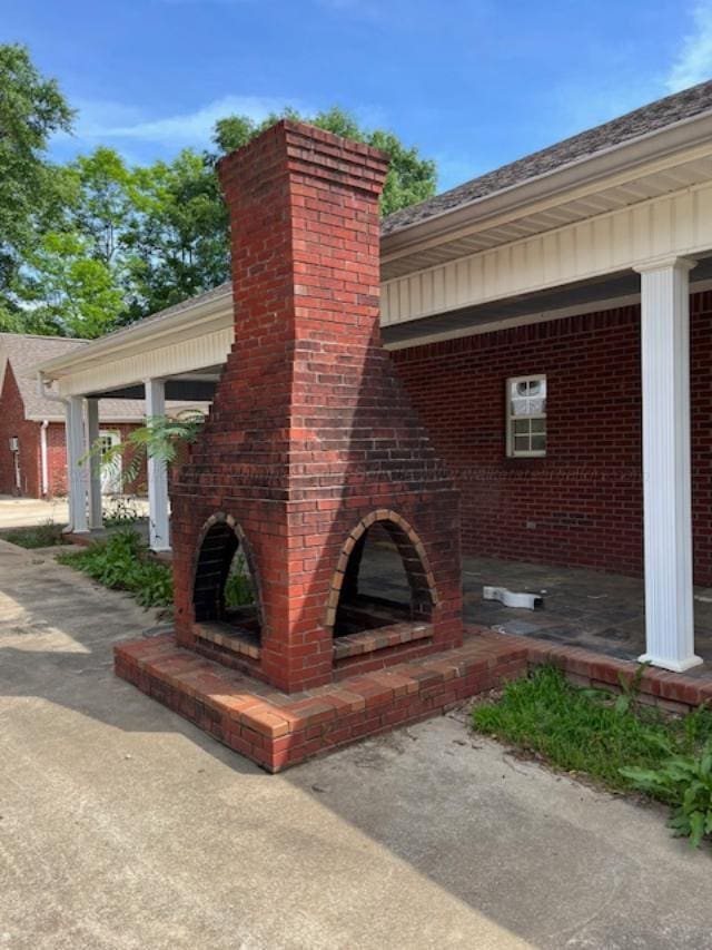 130 Quail Run Dr, Winfield, AL 35594 - view of patio / terrace with an outdoor brick fireplace