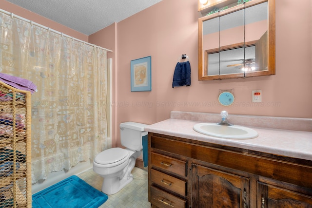 full bath with toilet, vanity, shower / tub combo with curtain, and a textured ceiling
