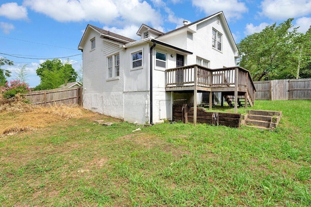 809 W 15th St, Jasper, AL 35501 - rear view of house featuring a deck, a fenced backyard, and stairs