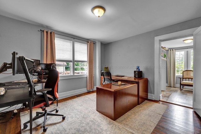 809 W 15th St, Jasper, AL 35501 - office space featuring healthy amount of natural light and wood finished floors